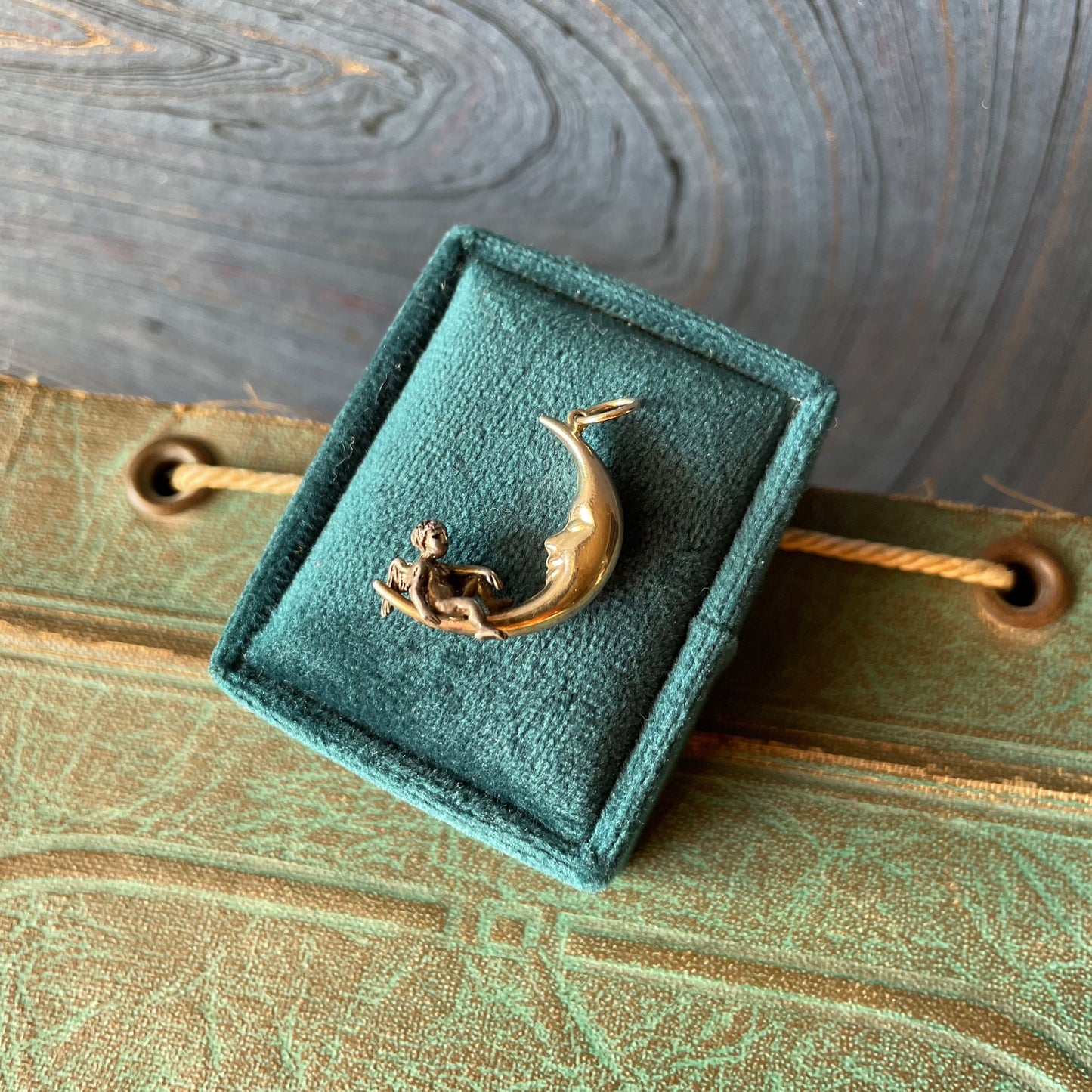 14k yellow gold crescent moon silver cherub charm